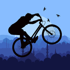 Mountain bike trial rider in arabic city landscape illustration