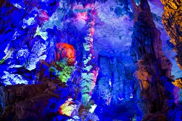 Foto op Canvas Famous Illuminated Reed Flute Cave in Yinziyan, China © TravelWorld