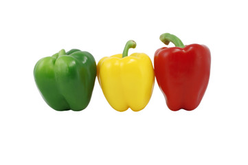Green, Red And Yellow Capsicum In A Row