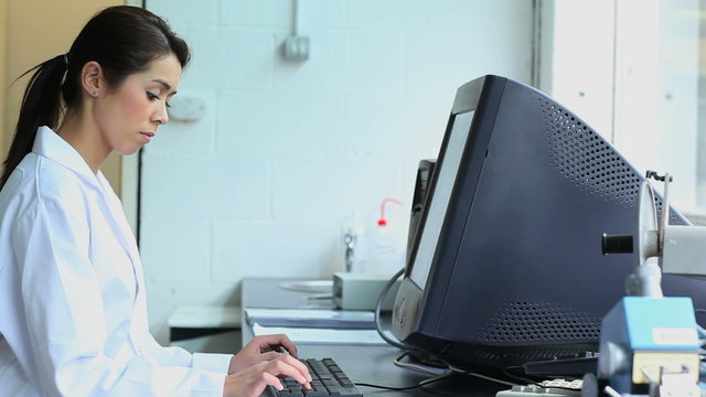 Young scientist working with a computer