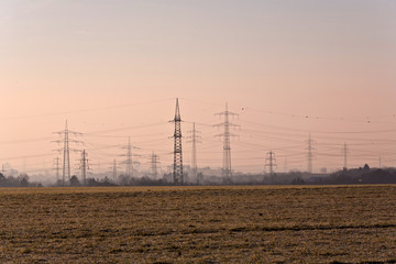 tower with powerlines in winter