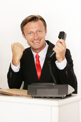 Naklejka premium Geschäftsmann am Telefon