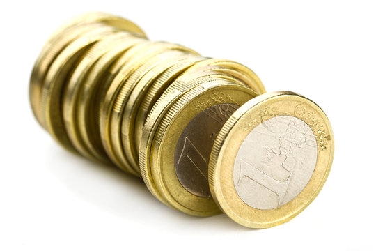 Line of one euro coins over white
