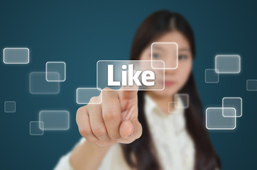 Business woman pressing like button