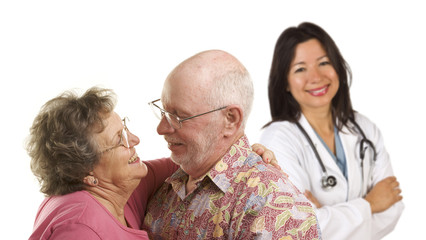 Cute Senior Couple with Medical Doctor or Nurse Behind