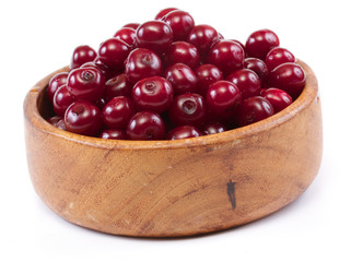 Bowl with ripe cherries. Isolated on a white background.
