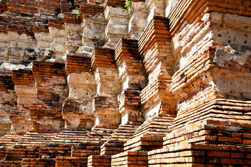 the repetition of brick pattern at the pagoda , thailand