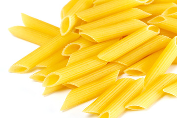dried italian pasta on white background