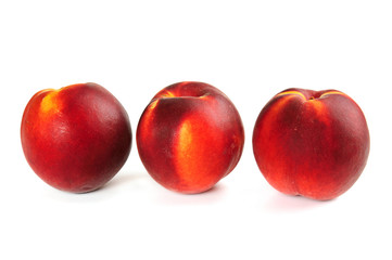 Fototapeta na wymiar Three fresh ripe peach