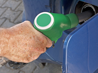 Filling car - petrol forecourt detail © Mushy