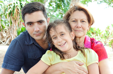 Happy latin family in a park