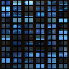Seamless texture of modern building windows at night - 35038684