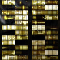 eamless texture resembling illuminated windows at night
