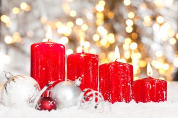 christmas background with red candles and christmas balls