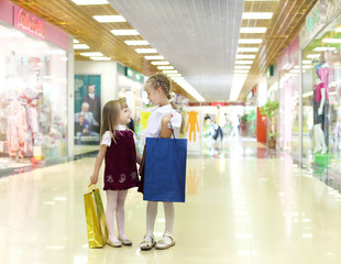 Little girl doing shopping