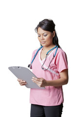 Nurse looking at chart