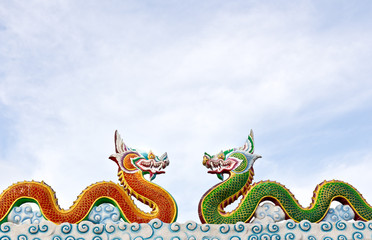 Two thai dragon statue with cloud in  the sky, Thailand