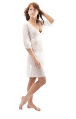 Beautiful young woman in modern dress on white background