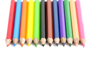 Color pencils crayons isolated in white background