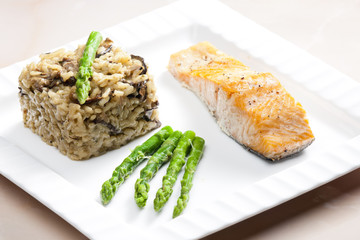 baked salmon with mushroom risotto and green asparagus
