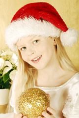 Mädchen mit Nikolausmütze/Girl with Santa Claus Cap