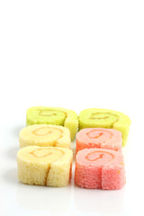 Obraz na płótnie Canvas colorful jam roll isolated in white background