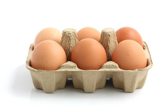 eggs in the package isolated in white background