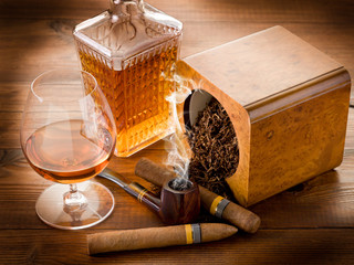 smoking pipe, tobacco, cuban cigar and liquor