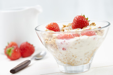 Milk with cereal and strawberries