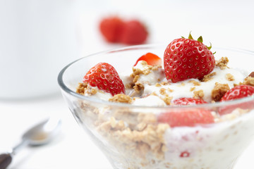 Milk with cereal and strawberries