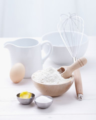 Fototapeta na wymiar ingredients and tools to make a cake, flour, butter, sugar,eggs