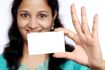 Young Woman holding out business card