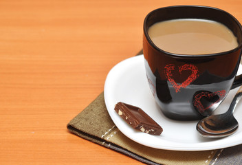 Black hot coffee cup with chocolate