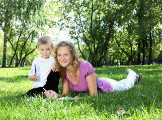 Fototapeta premium Mother with little son in the park