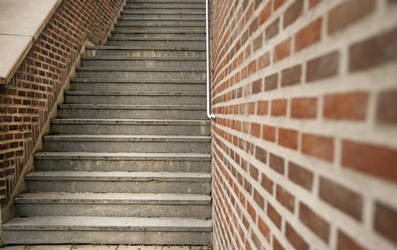 Staircase and brick wall