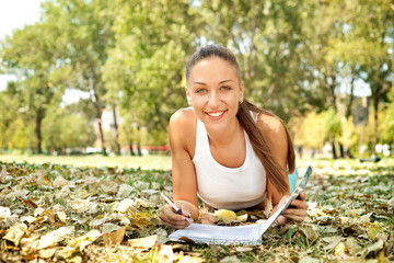 smiling student girl in park