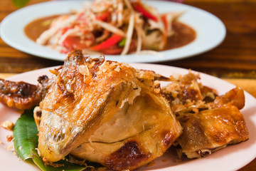 Fresh barbecue chicken,Thai papaya salad and vegetable on the ta