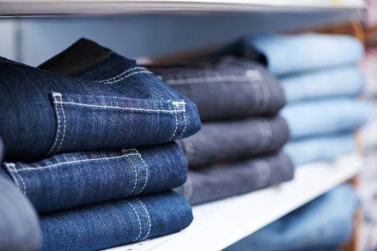 jeans clothes on shelf in shop