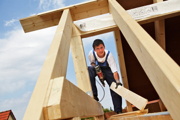 carpenters constructing a dormer