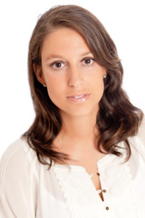 Serious young woman in white shirt