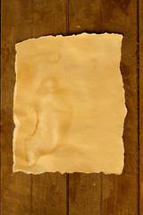 Fototapeta premium old paper on brown wood