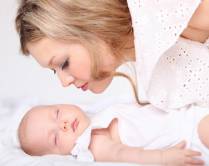 Portrait of a young mother and baby