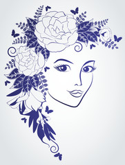 Beautiful fashion woman's face with flowers.