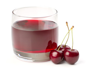 Cherries and a glass of cherry juice isolated on white