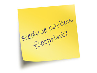 Yellow Post It Note With The Text Reduce Carbon Footprint