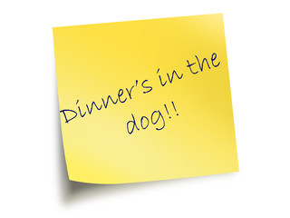 Yellow Post It Note With The Text Dinner's In The Dog