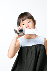 Fototapeta premium ビデオ撮影をする女の子