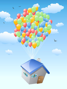 house with balloons flying in the blue sky