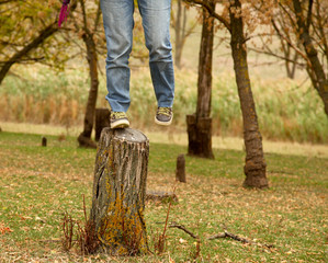Female's foots at stump.