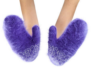 Hands in fluffy lilac mittens